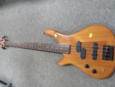 A STAGG LEFT HANDED BASS GUITAR
