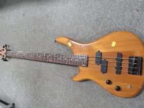 A STAGG LEFT HANDED BASS GUITAR