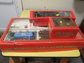 A BOXED MAMOD CARRIAGE TOGETHER WITH A BOX OF TC1 CURVED TRACK AND A BOXED TS1 STRAIGHT TRACK AND