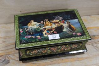 A DECORATIVE LACQUERED JEWELLERY BOX