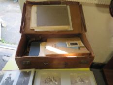 A LEATHER SUITCASE OF VICTORIAN AND LATER POSTCARDS AND PHOTOGRAPHS TO INCLUDE ALBUMS