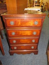 A REPRODUCTION MAHOGANY FOUR DRAWER CHEST