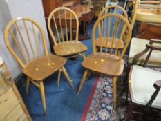 A SET OF FOUR ERCOL STYLE HOOP BACK CHAIRS