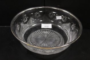 A CUT GLASS BOWL WITH HALLMARKED SILVER RIM, Dia. 22.5 CM