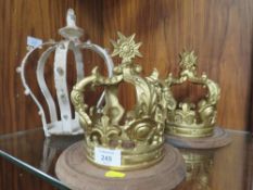 A PAIR OF GILT METAL CORONET TOGETHER WITH A LARGE WHITE EXAMPLE (3 )