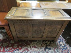 A 20TH CENTURY OAK CARVED COFFER W-97 CM