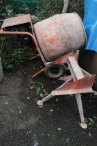 A 3.5 HP PETROL CEMENT MIXER AND STAND