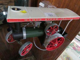 A MAMOD STEAM TRACTOR TOGETHER WITH A MAMOD POLISHING WHEEL