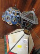 A TIFFANY STYLE LAMP SHADE PLUS ANOTHER AND A LEADED GLASS LANTERN (3)