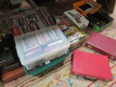 A GOOD QUANTITY OF 7" SINGLE RECORDS , CD'S , VINTAGE CASSETTES AND VIDEO CASSETTES