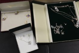 A SELECTION OF MODERN SILVER GEMSET JEWELLERY EARRING AND NECKLACE SETS
