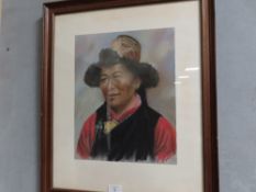A FRAMED AND GLAZED PASTEL STUDY OF TIBETAN WOMAN BY J A HULBERT