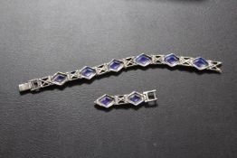 AN ART DECO STYLE MARCASITE AND PANEL LINK SILVER BRACELET STAMPED 925 FOR REPAIR (AS FOUND)