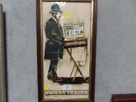 A FRAMED TWO TILED PICTURE ENTITLED STREET TRADER