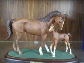 A ROYAL DOULTON CERAMIC MARE AND FOAL STUDY ENTITLED 'FIRST BORN' - MARKED AS A SECOND