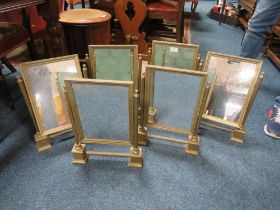 A SET OF SIX BRASS SMALL SWING MIRRORS A/F- TWO MIRRORS CRACKED