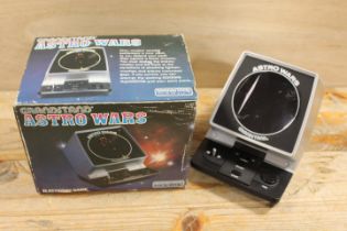 A BOXED VINTAGE GRANDSTAND ASTROWARS GAME - UNCHECKED