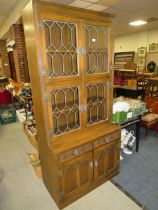 AN 'OLD CHARM' LEADED BOOKCASE - H 198 cm, W 92 cm