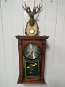 A LEGEND WALL CLOCK TOGETHER WITH A PLASTIC BAROMETER