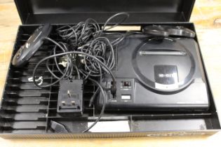 A CASED VINTAGE SEGA MEGADRIVE 16BIT CONSOLE ETC