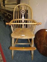 AN ANTIQUE CHILDS WINDSOR STYLE HIGH CHAIR