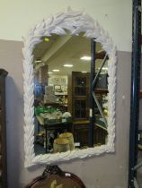 A MODERN CREAM HALL MIRROR