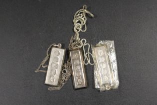 THREE HALLMARKED SILVER INGOT STYLE NECKLACES