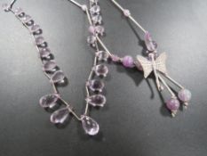 A SILVER AND AMETHYST BUTTERFLY THEMED STYLE BEAD NECKLACE TOGETHER WITH A SILVER AND FACETED
