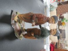 A COLD PAINTED CAST METAL FIGURE OF DUTCH BOYS SMOKING