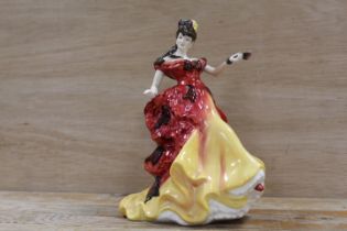 A ROYAL DOULTON FIGURINE OF THE YEAR 1996 'BELLE'