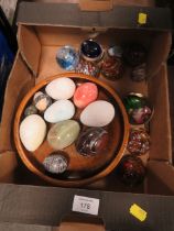 A SMALL TRAY OF GLASS PAPER WEIGHTS , POLISHED STONE EGGS ETC