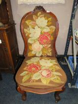 A VICTORIAN MAHOGANY FRAMED NEEDLEPOINT CHAIR