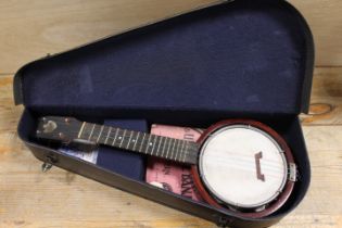 A VINTAGE CASED UKULELE