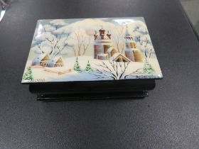 A MODERN RUSSIAN TYPE BLACK LACQUER BOX WITH HAND PAINTED WINTER SCENE SIGNED LOWER RIGHT TOGETHER