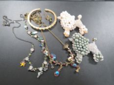 A COLLECTION OF DESIGNER COSTUME JEWELLERY TO INCLUDE A BUTLER AND WILSON CHRISTMAS NECKLACE,