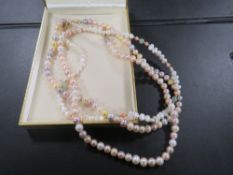 THREE MODERN PEARL NECKLACES , ONE WITH 9CT GOLD CLASP ANOTHER WITH 14 K CLASP