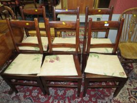 A SET OF SIX COUNTRY OAK BAR BACK CHAIRS