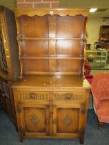 AN OAK CARVED SMALL WELSH STYLE DRESSER