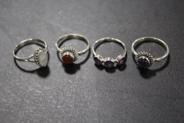 A COLLECTION OF FOUR 925 SILVER GEMSTONE DRESS RINGS TO INC AMETHYST ETC