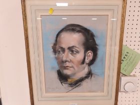 A FRAMED AND GLAZED PASTEL PORTRAIT OF A GENTLEMAN SIGNED AND DATED LOWER LEFT "VERSO STICKERED WITH