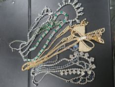 A COLLECTION OF SEVEN DIAMANTE NECKLACES TO INCLUDE TWO ART DECO STYLE EXAMPLES, TOGETHER WITH TWO