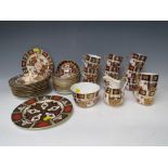 A FORD AND POINTON CHINA TEA SET, comprising eleven cups, twelve saucers, twelve side plates,