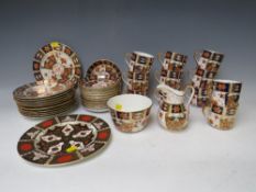 A FORD AND POINTON CHINA TEA SET, comprising eleven cups, twelve saucers, twelve side plates,