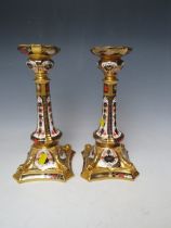 A PAIR OF ROYAL CROWN DERBY OLD IMARI PATTERN CANDLESTICKS - ONE CANDLESTICK A/F, pattern no.
