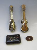 FOUR VINTAGE ITEMS OF TORTOISESHELL, comprising a loupe, decorative purse with flowers and