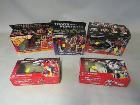 FIVE BOXED HASBRO TRANSFORMERS TO INCLUDE SCATTERSHOT, Slag, Sideswipe, Jazz and Duocon Flywheels