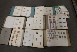 A TRAY OF BRITISH, COMMONWEALTH AND WORLD STAMP ALBUMS, comprising eight albums and a folder of