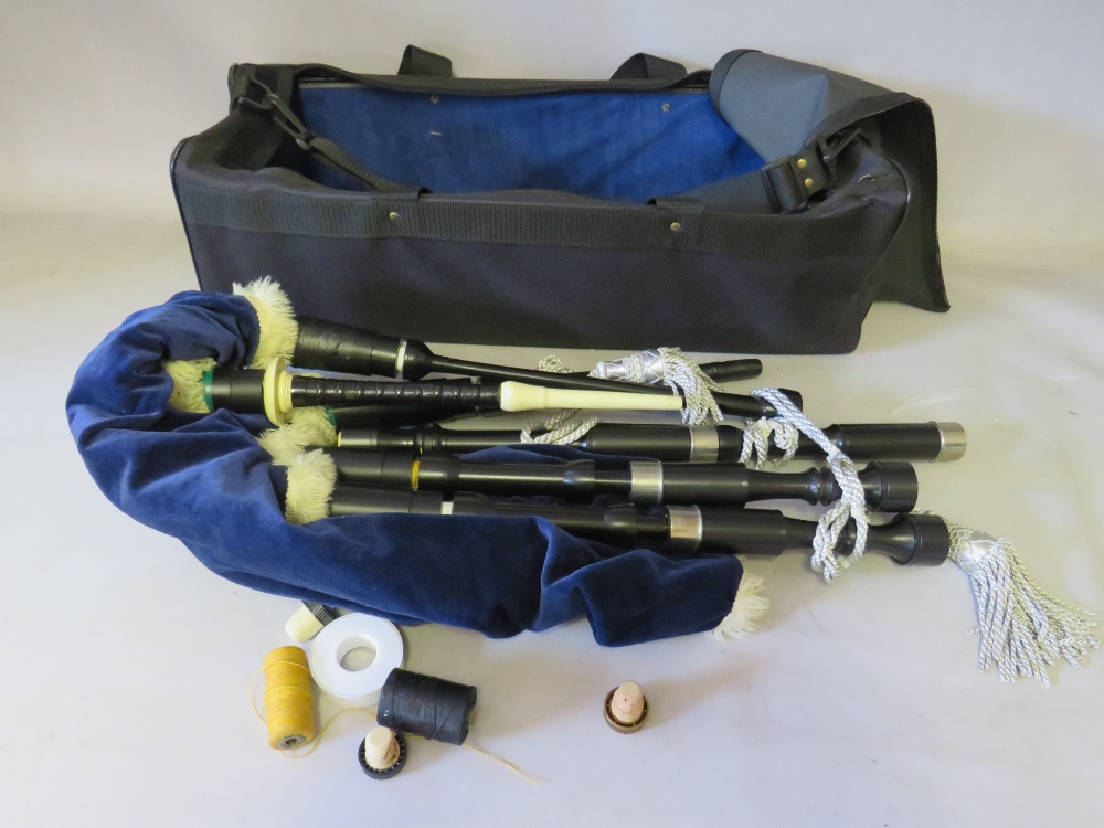 A SET OF LEON HIGHLANDER BAG PIPES, with thistle of Blantyre carry case