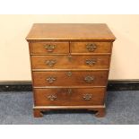 A 19TH CENTURY CHEST OF SMALL PROPORTIONS, having two short above three longer graduated drawers,