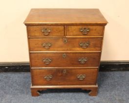 A 19TH CENTURY CHEST OF SMALL PROPORTIONS, having two short above three longer graduated drawers,